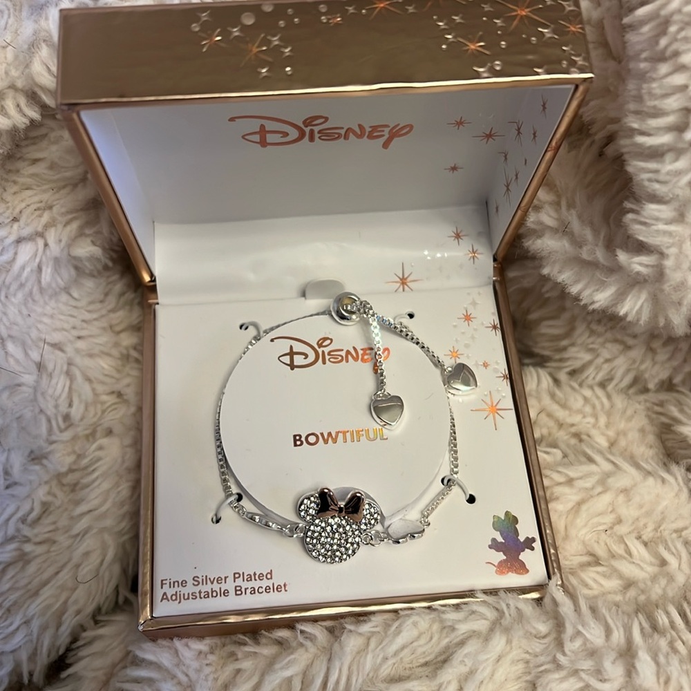 LA Rocks “Bowtiful” fine silver plated adjustable bracelet from Disney.com